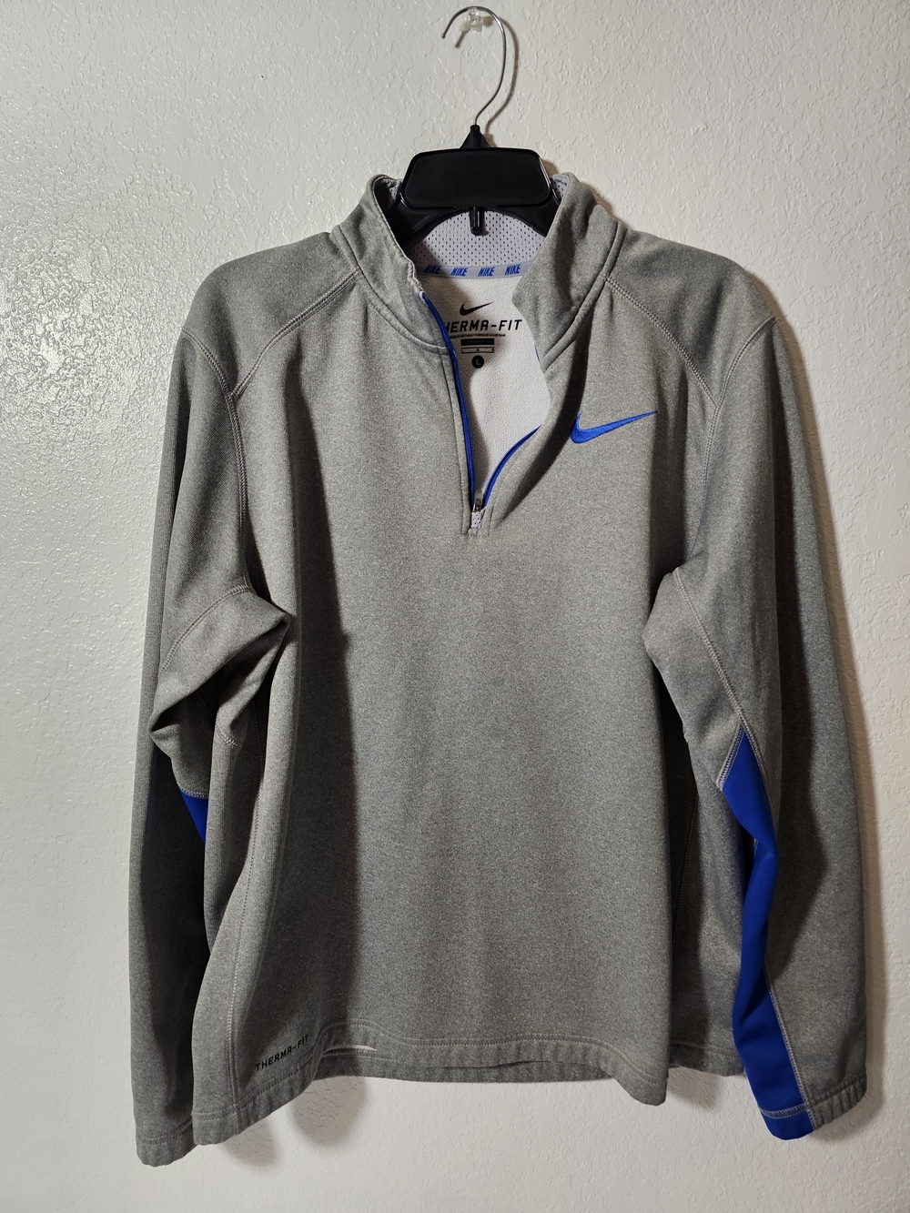 Nike Men's Gray Quarter-Zip Sweater with Blue Accents